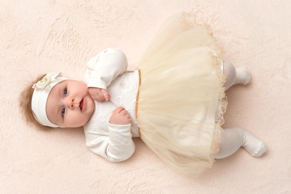 Elegant baby formal wear including christening gowns, holiday outfits, and special occasion clothing