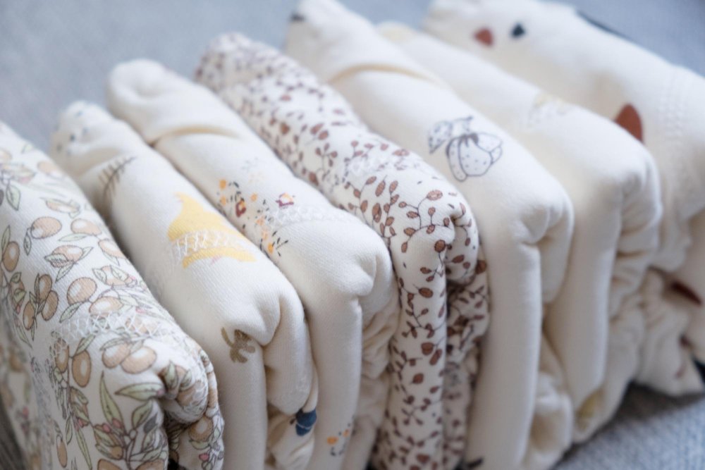 Best Fabrics for Newborn Clothing: Complete Safety Guide 2025