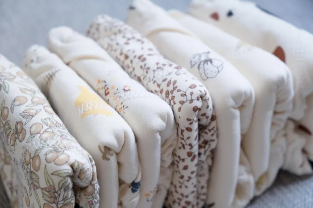 Best Fabrics for Newborn Clothing: Complete Safety Guide 2025