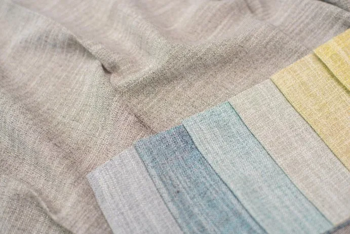 Natural summer fabrics including linen, cotton, and silk