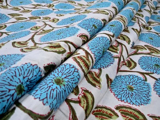 traditional Indian cotton fabric with floral block print pattern and soft natural textile texture