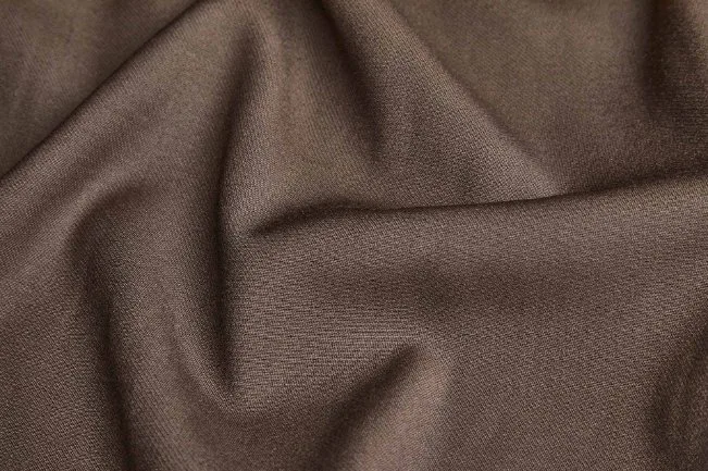 brown Italian wool suiting fabric with smooth weave ideal for tailored suits