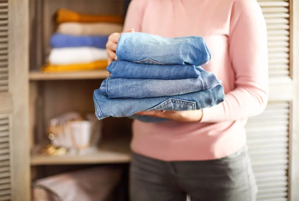 Proper jean care techniques including washing, drying, and storage methods