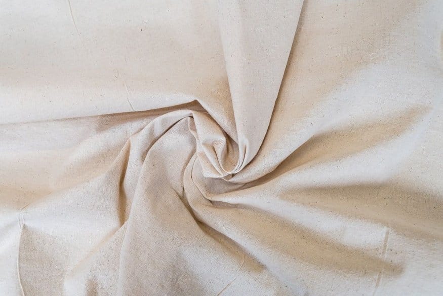 Natural beige linen and hemp blend fabric with breathable woven texture