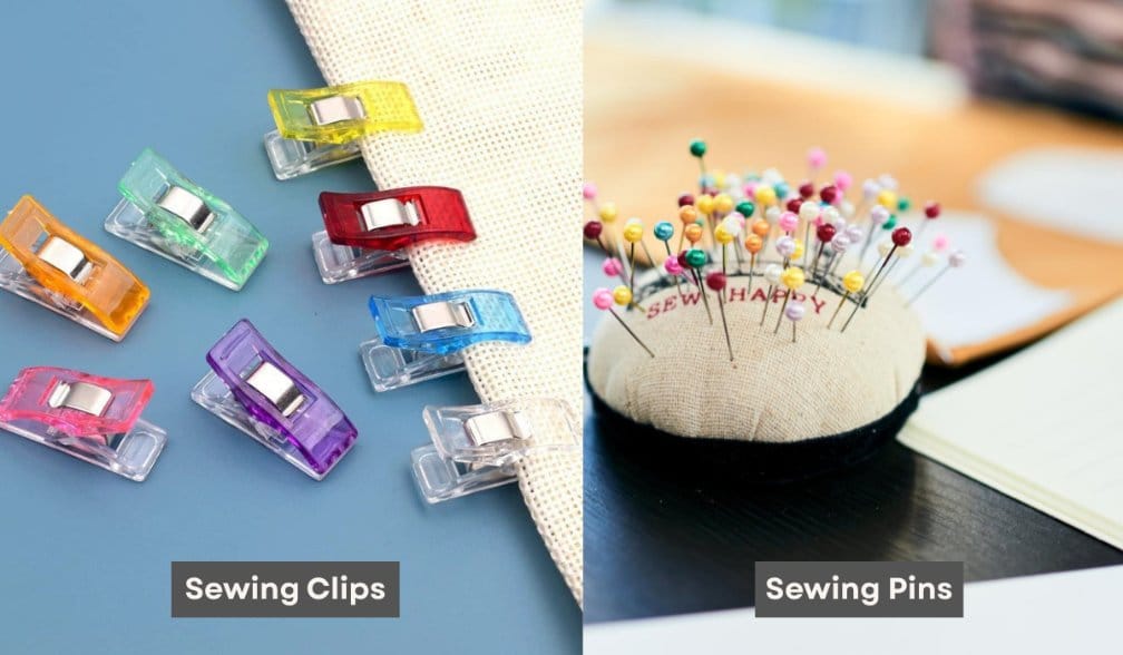 Colorful sewing clips and traditional sewing pins used for holding fabric layers
