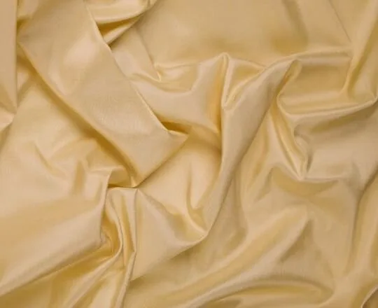 gold Thai silk fabric with smooth texture and natural silk sheen