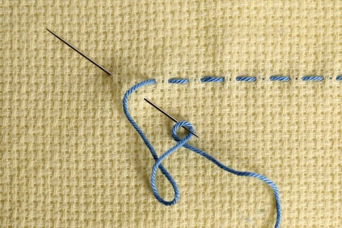 Example of basic straight stitch sewn evenly across woven fabric