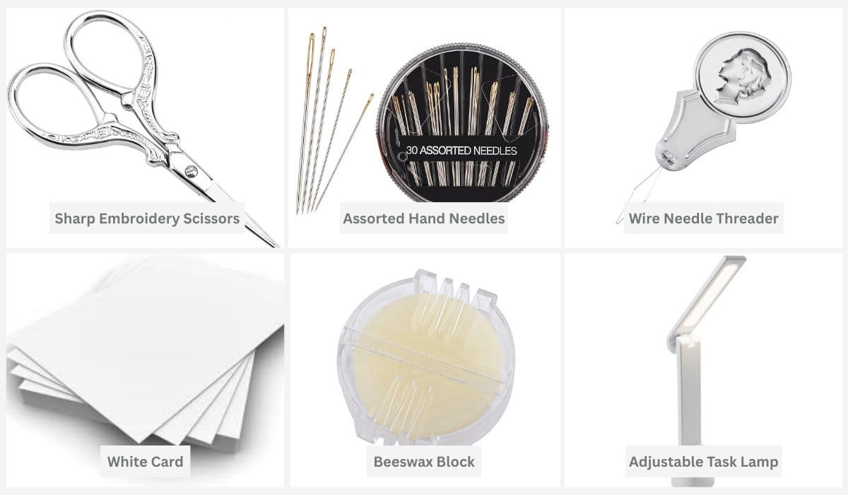 Sewing toolkit including embroidery scissors, assorted needles, threader, beeswax, and task lamp