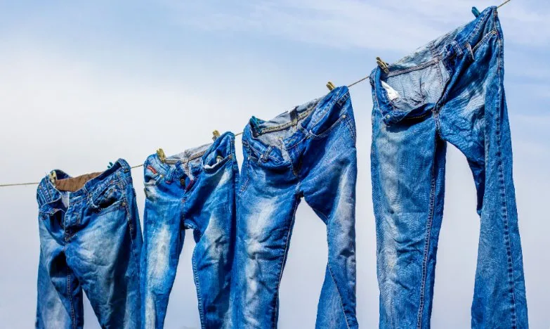 denim jeans being air-dried outside