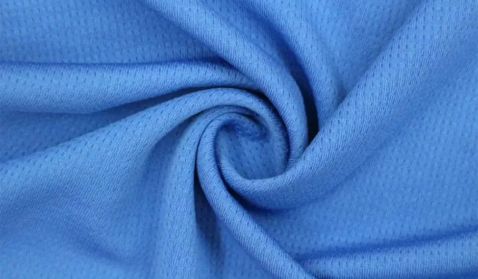 Blue moisture wicking performance fabric with breathable knit structure