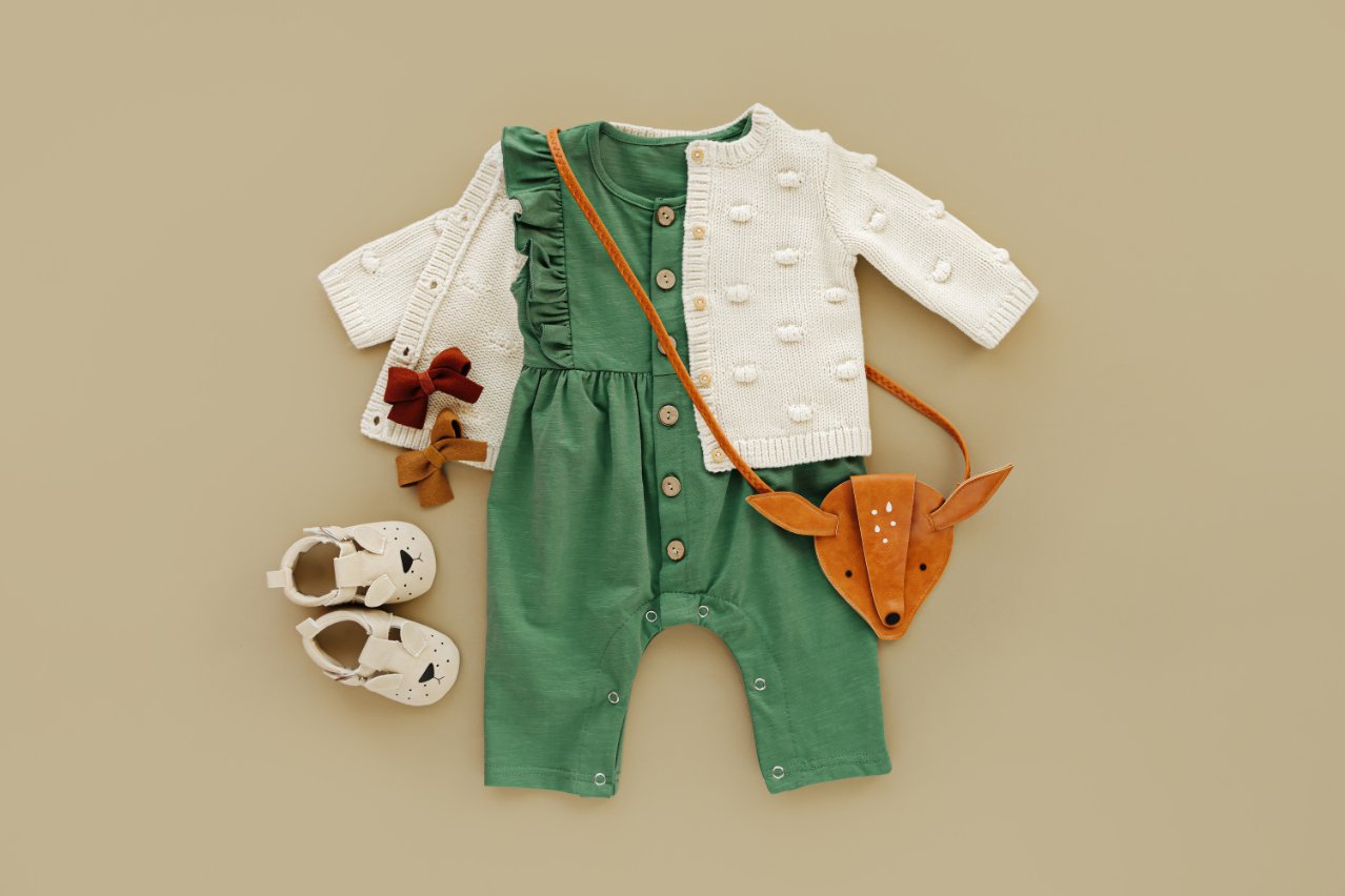 Colorful toddler accessories including hats, bags, hair accessories, and functional items for completing outfits