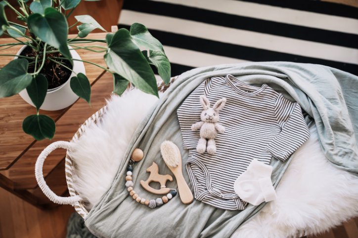 The importance of sustainable fashion in newborn apparel showing eco-friendly baby clothes and environmental benefits