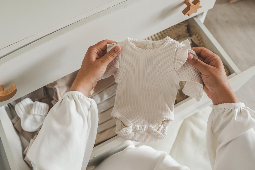 Baby wearing soft hypoallergenic clothing made from organic cotton and bamboo fabrics