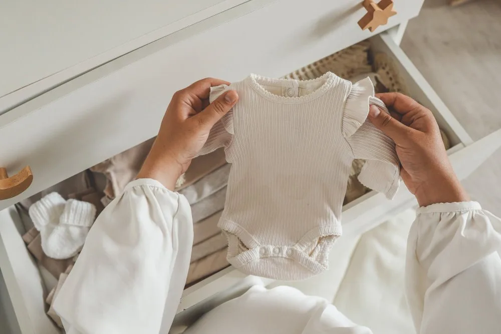 Baby wearing soft hypoallergenic clothing made from organic cotton and bamboo fabrics