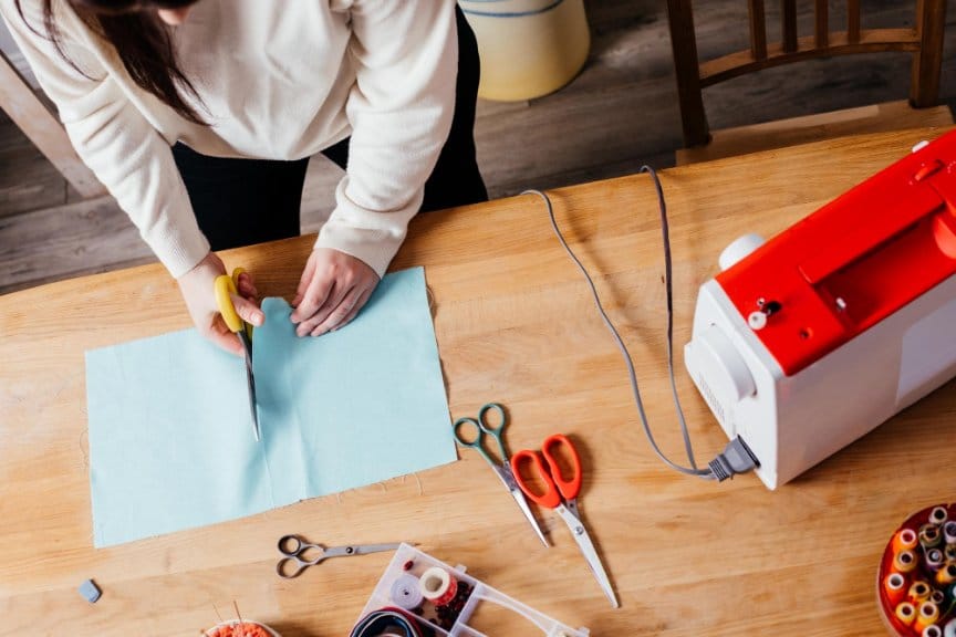 A seamstress with different sewing tools