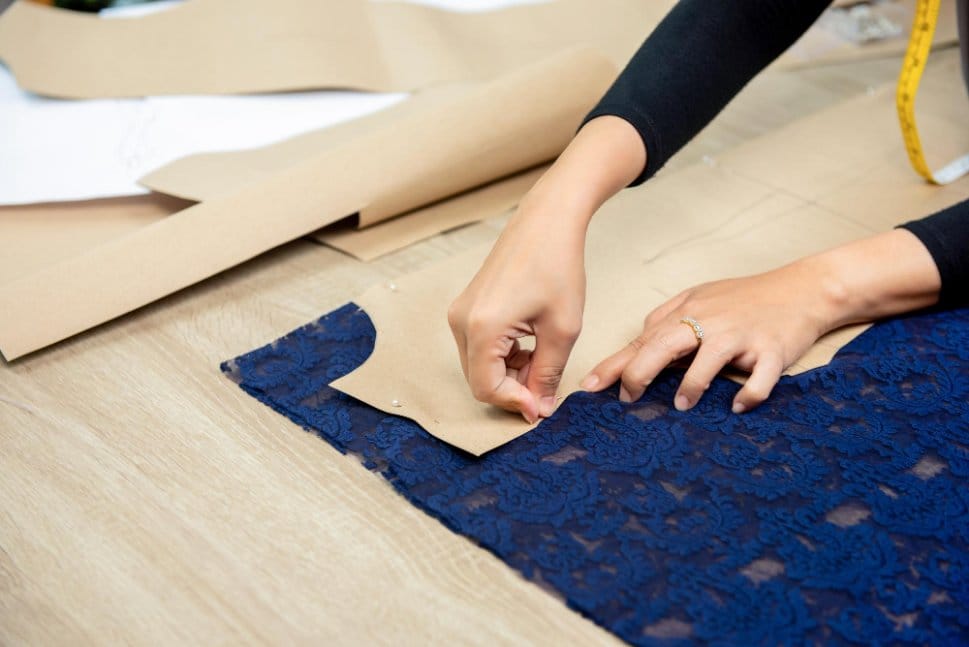A woman using sewing pattern
