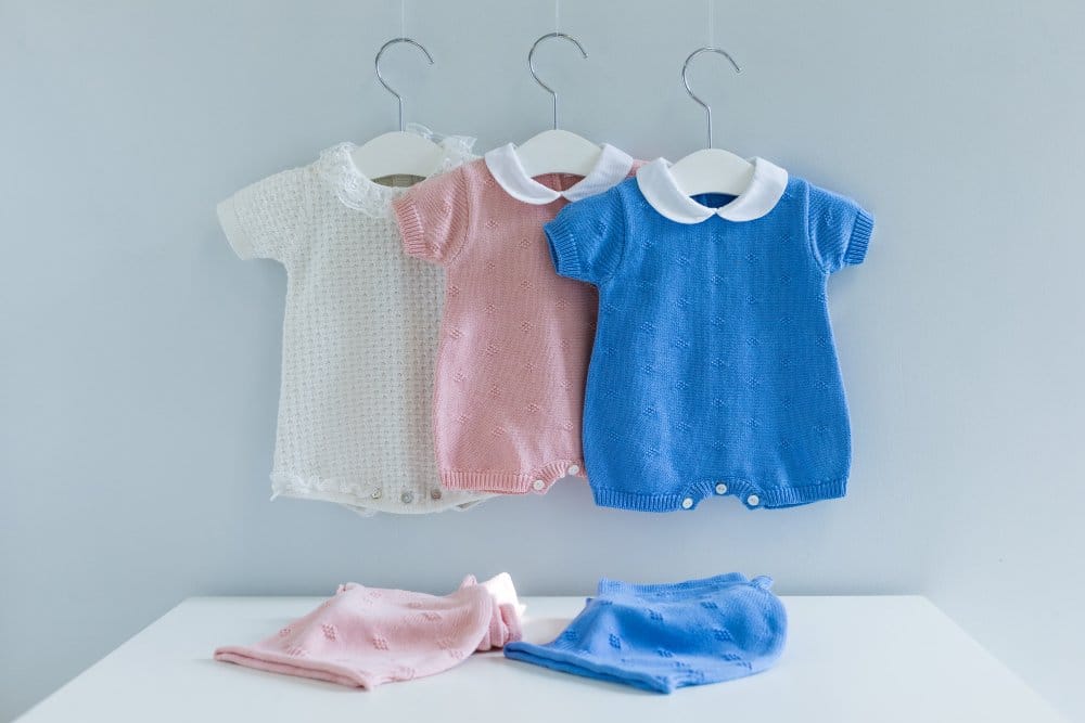 Toddlers clothes hung on a clothing rack