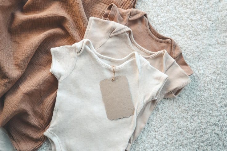 Set of stylish cute baby bodysuits
