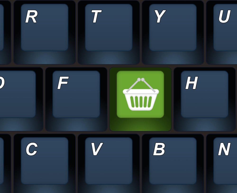 A keyboard with shopping cart icon on it
