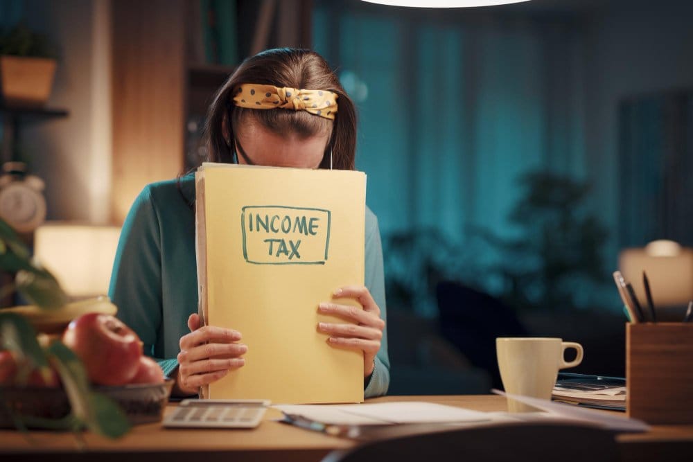 A woman filing her tax return for income tax