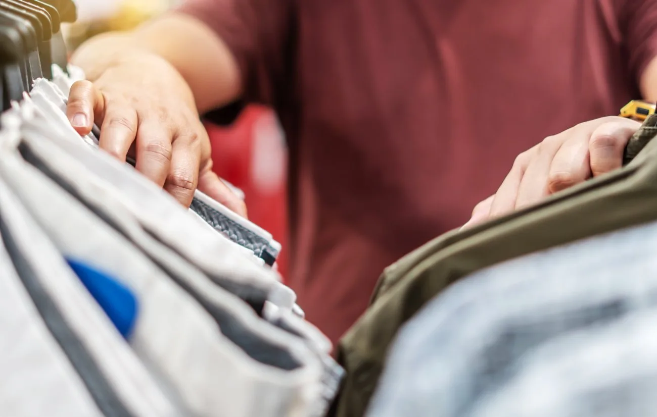 Modern clothing rental service package with organic toddler clothes neatly arranged in eco-friendly packaging