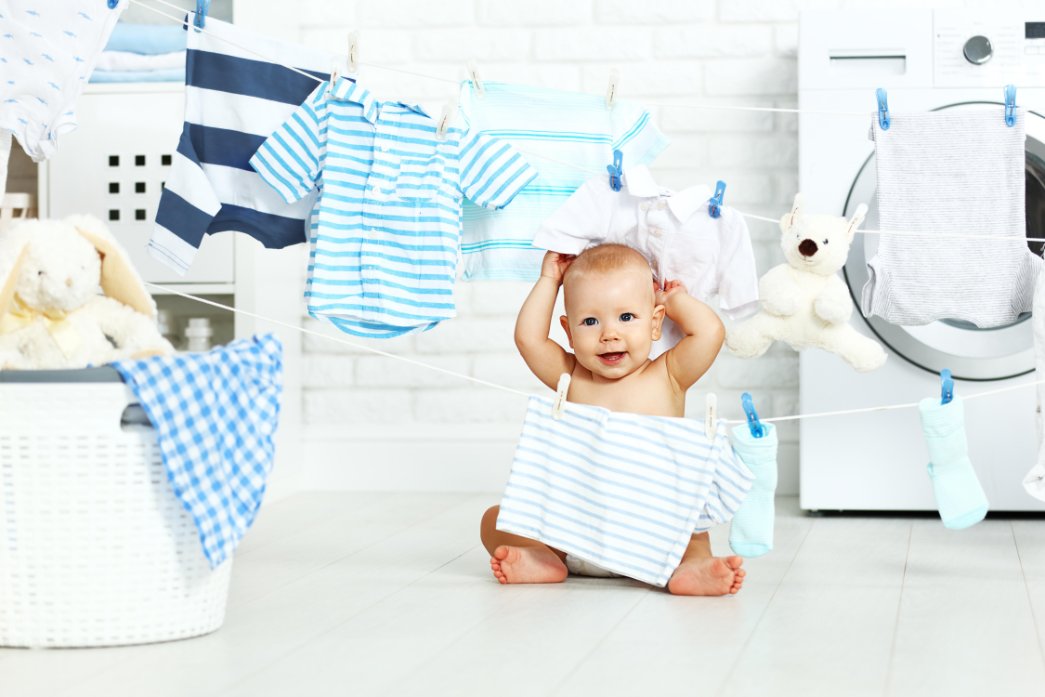 Step-by-step guide to proper baby clothes washing techniques showing safe detergents and washing methods