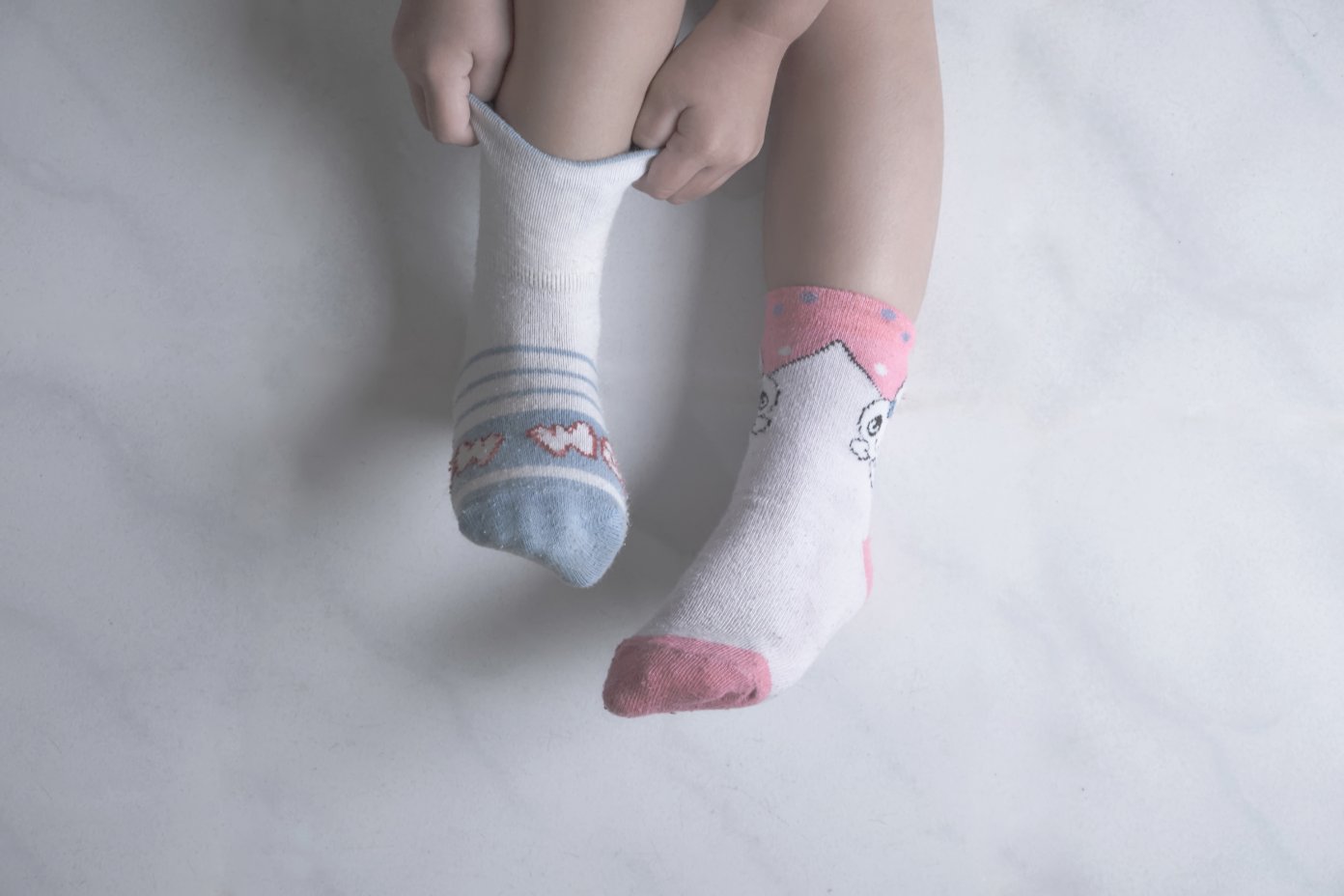 Toddler undergarments and layering pieces including undershirts, training pants, socks, and comfortable base layers