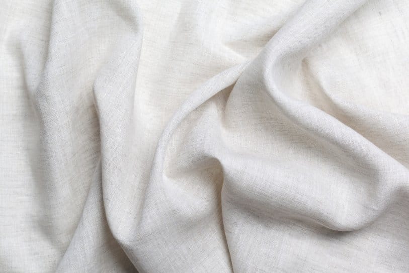Soft white organic cotton fabric with smooth breathable weave
