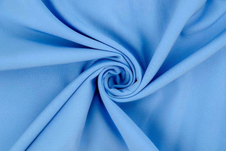 Smooth polyester fabric texture in neutral tone with slight sheen