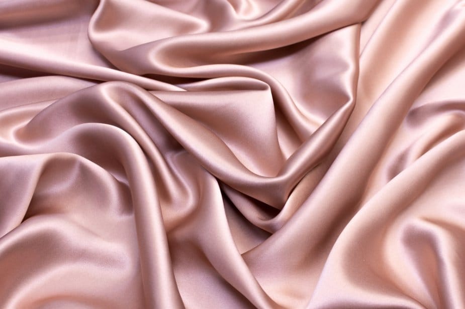 Smooth silk fabric with natural sheen and fluid elegant drape