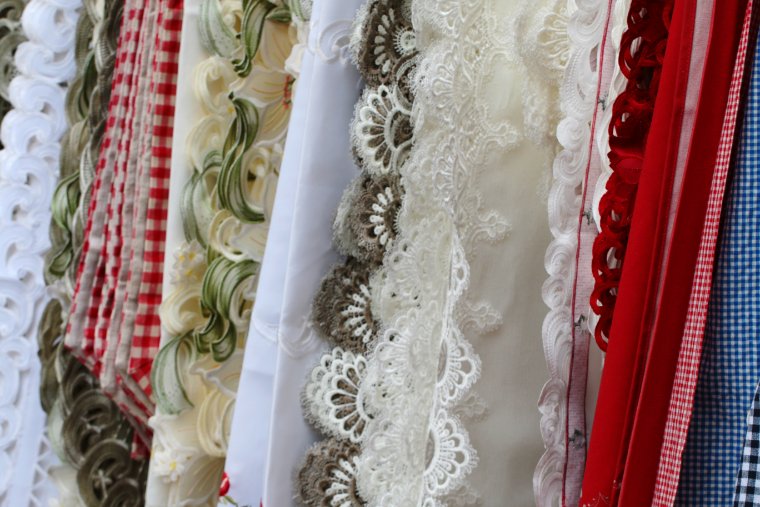 Tape lace fabric applications in wedding dresses, home curtains, and fashion accessories