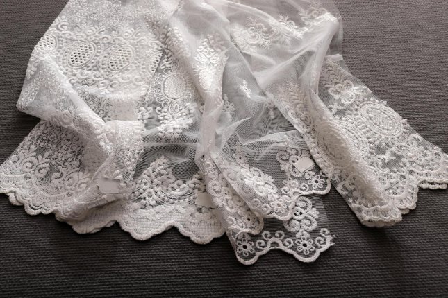 Introduction to Tulle Lace Fabric showing delicate mesh texture and ethereal quality