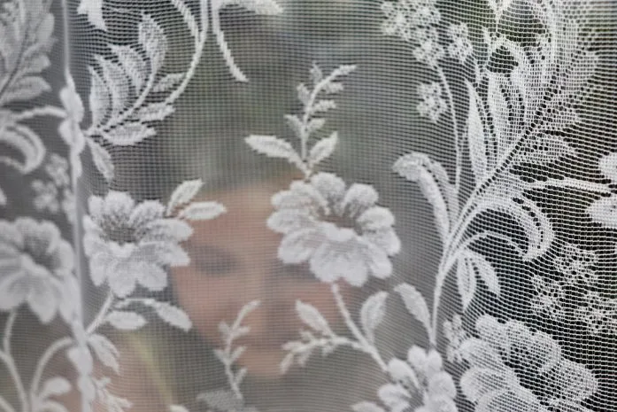 Historical filet lace examples showing traditional patterns and techniques