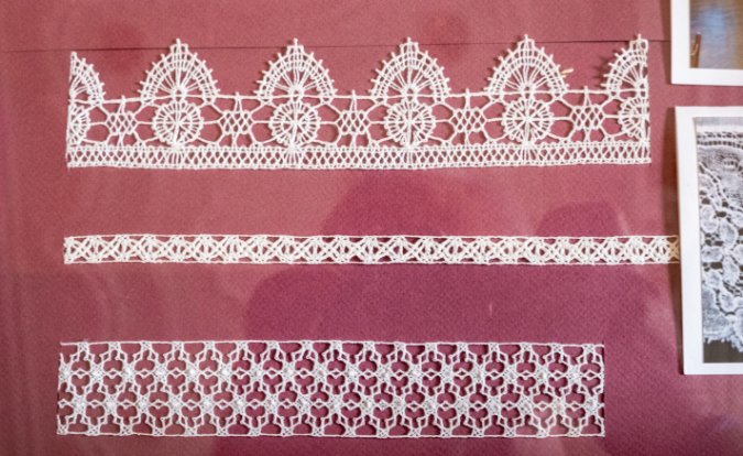 Close-up view of Cluny lace showing geometric patterns and floral motifs