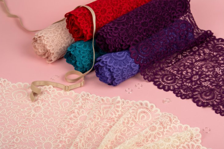 Chemical lace fabric samples showing intricate patterns and delicate openwork designs