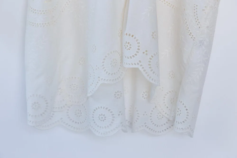 Different types of cotton eyelet lace fabric showing various patterns and weights