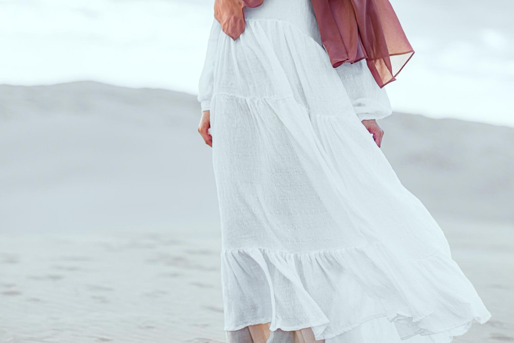 Various applications and uses of cotton batiste fabric in fashion, bedding, and home textiles