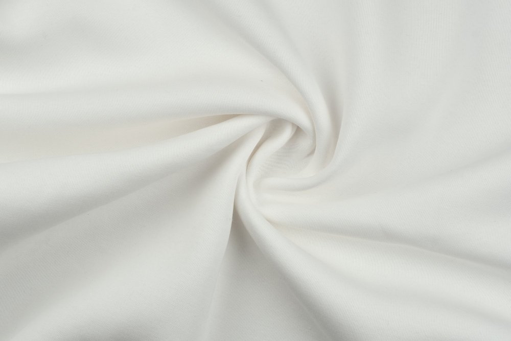 Close-up of broadcloth cotton fabric texture.