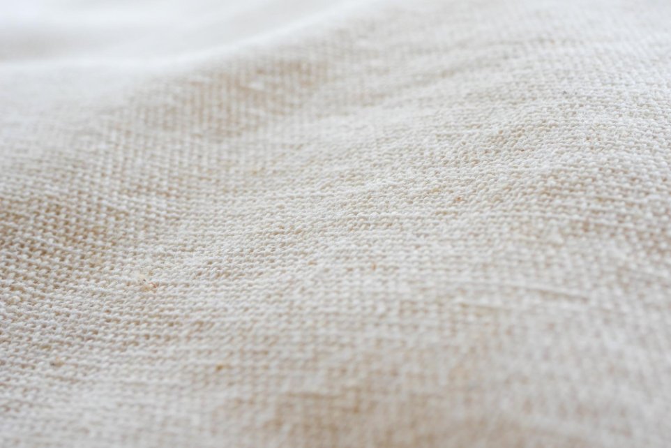 Close-up of the weave and texture of calico cotton fabric.