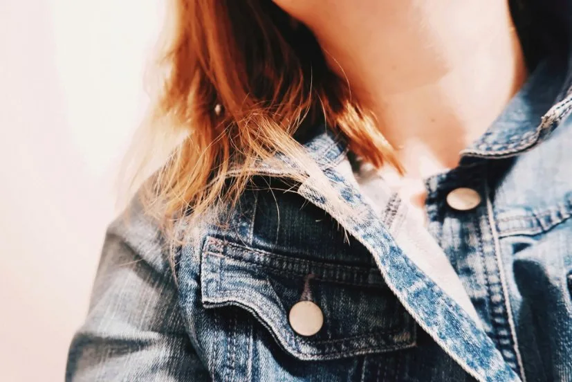 Array of denim fashion items including jackets, skirts, dresses, bags, and accessories showing the versatility of denim fabric beyond jeans