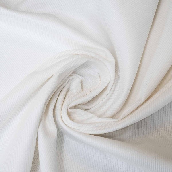 Close-up view of corduroy cotton fabric showing the distinctive wales and texture