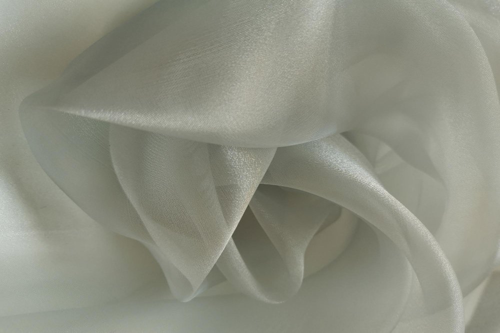 Various lightweight fabrics suitable for French seams including chiffon, silk, and cotton voile