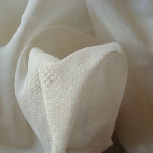 Close-up view of cambric linen fabric showing smooth texture and tight weave