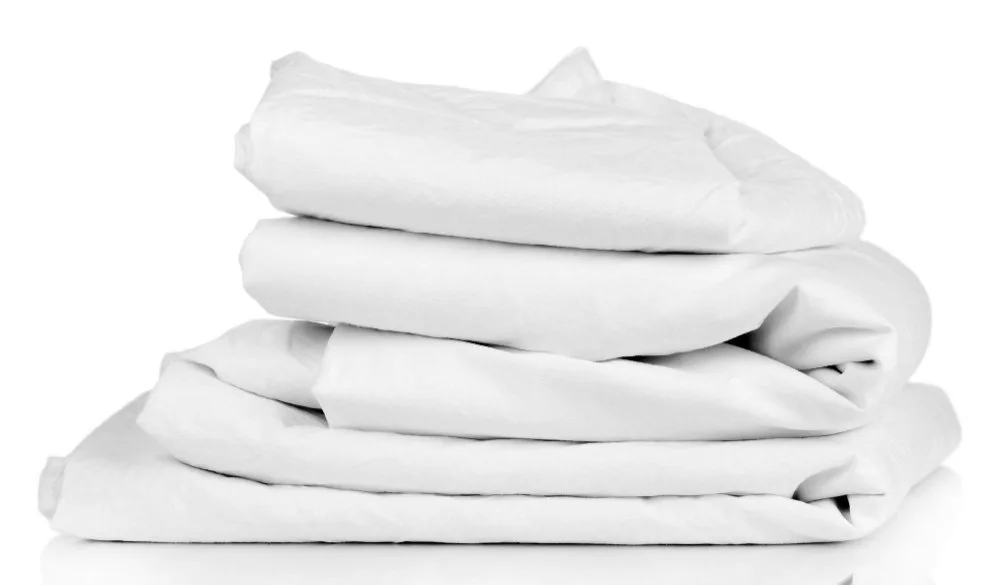 Linen fabric care essentials including washing, drying, and storage methods for longevity