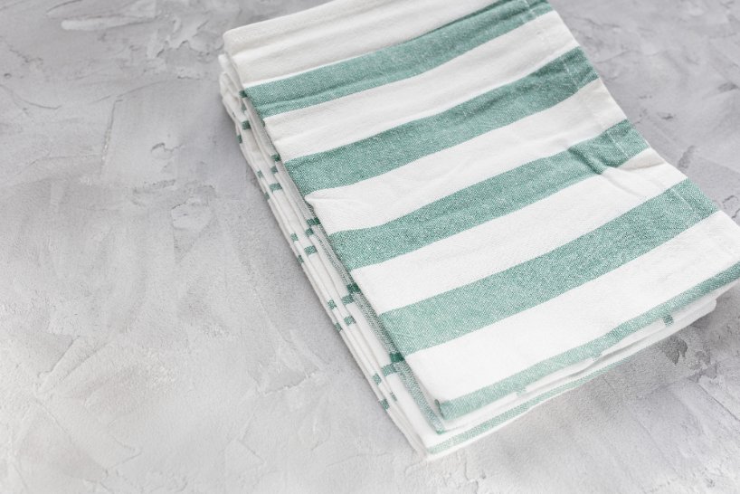 Various linen towel designs showing colors, patterns, and style options available