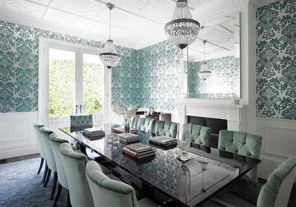 Elegant dining room featuring damask tablecloth and napkins with modern table setting