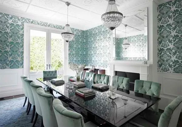 Elegant dining room featuring damask tablecloth and napkins with modern table setting