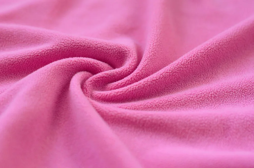 Soft pink microfiber fabric with a smooth, suede-like texture.