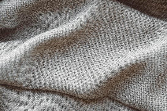 Detailed view of cambric linen plain weave structure showing thread intersections
