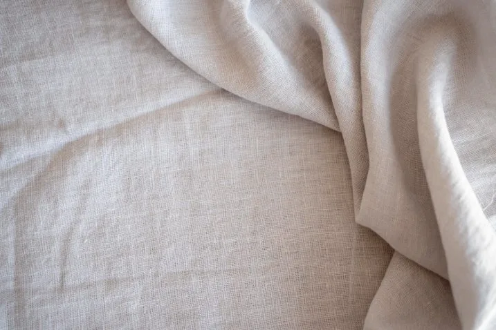 Close-up of premium Holland linen fabric showing superior quality weave and texture